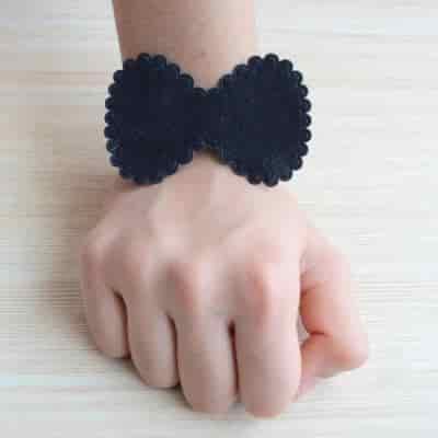 Buy Strands Contemporary Black Bow Hand Cuff Stretch Bracelet Rakhi