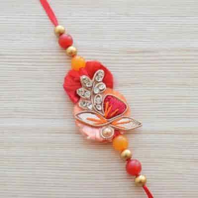 Buy Strands Coral and Red Festive Rakhi Brother