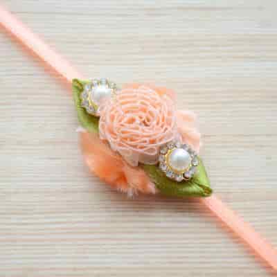 Buy Strands Delicate Peach Flower Rakhi for Raksha Bandhan
