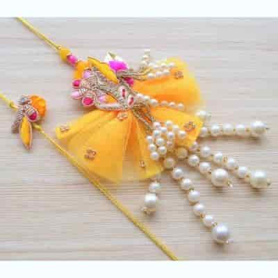 Buy Strands Elegant Pearl Tassels and Lumba Rakhi Gift Set for Bhaiya