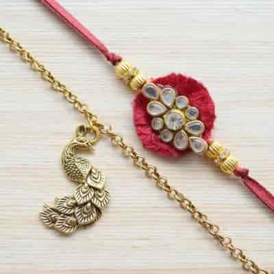 Buy Strands Kundan Rakhi and Intricate Peacock Bracelet Set