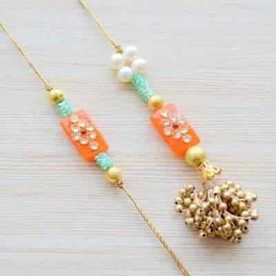 Buy Strands Kundan Stone and Saffron Beads Couple Raksha Bandhan Gift