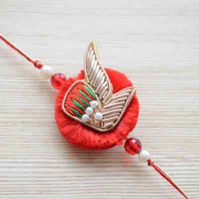 Buy Strands Traditional Red and Green Rakhi for Brother