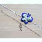 Strands Butterfly Rakhi with Stick Figure Bracelet Gift Set