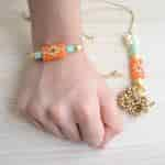 Strands Kundan Stone and Saffron Beads Couple Raksha Bandhan Gift