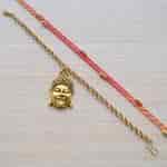 Strands Sacred Mauli Rakhi with Smiling Buddha Bracelet Gift Set